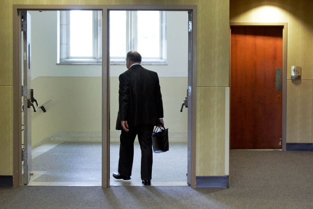 Loftin exits Memorial Student Union after Faculty Council meeting